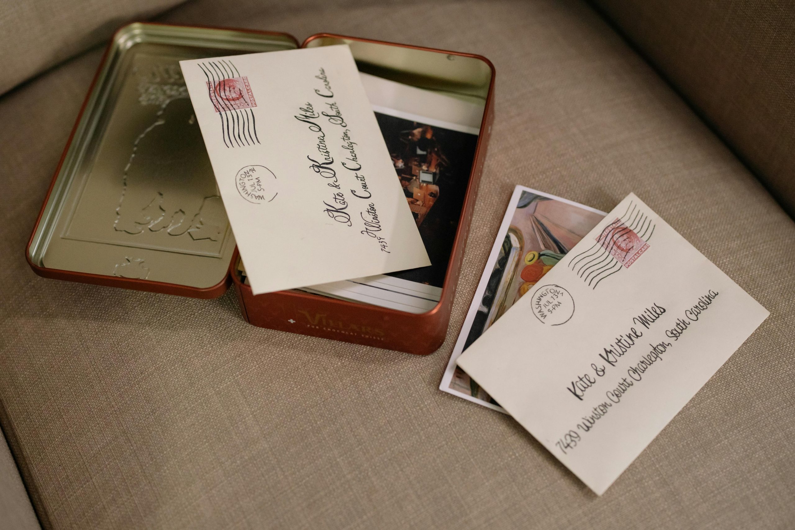 letters and photos stored in a tin can